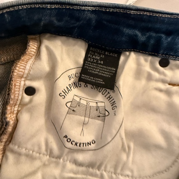 Buckle Distressed Flare Jeans - Picture 6 of 10